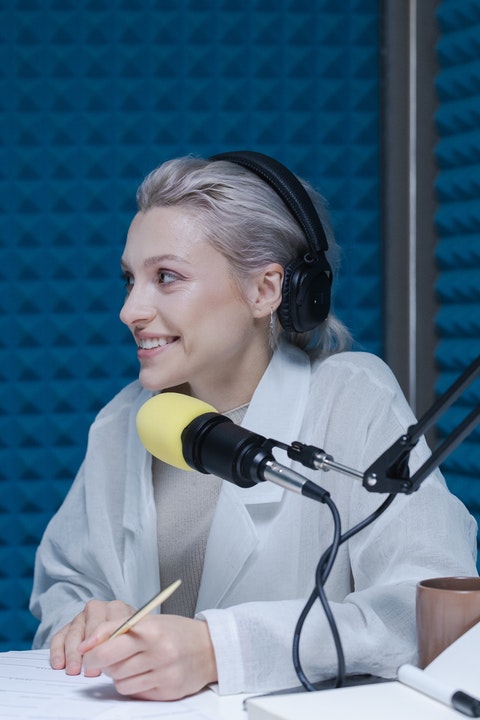 woman recording headphones