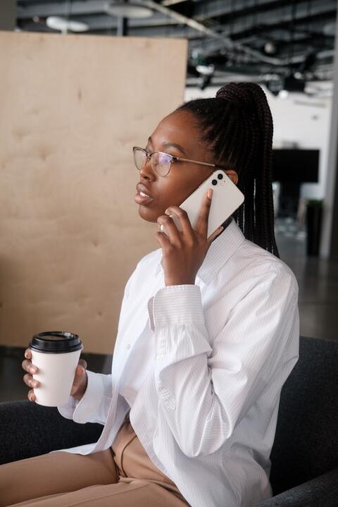 black-businesswoman-speaking-on-smartphone