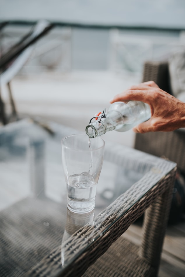 Person Pouring Water