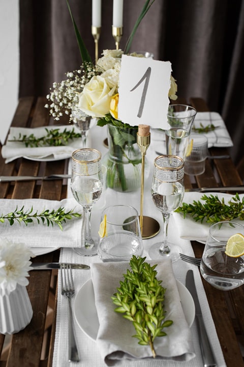 high-angle-wedding-table-arrangement-with-plates