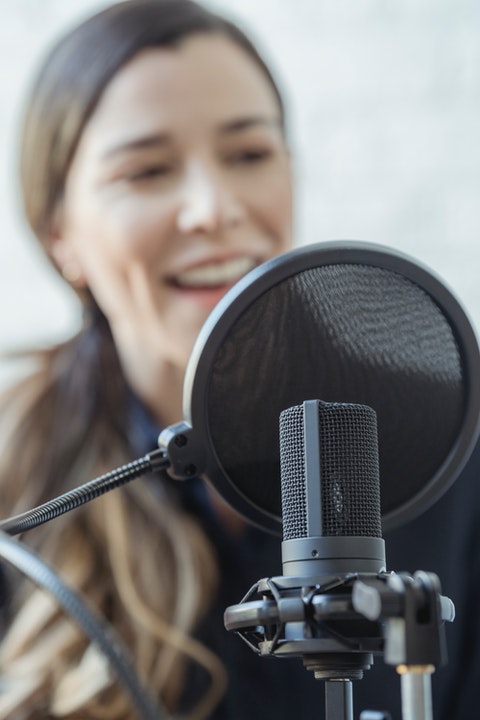 happy woman recording