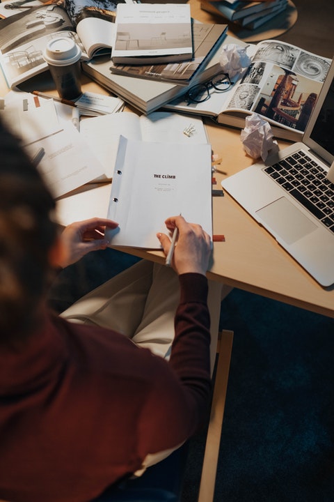 person holding paper